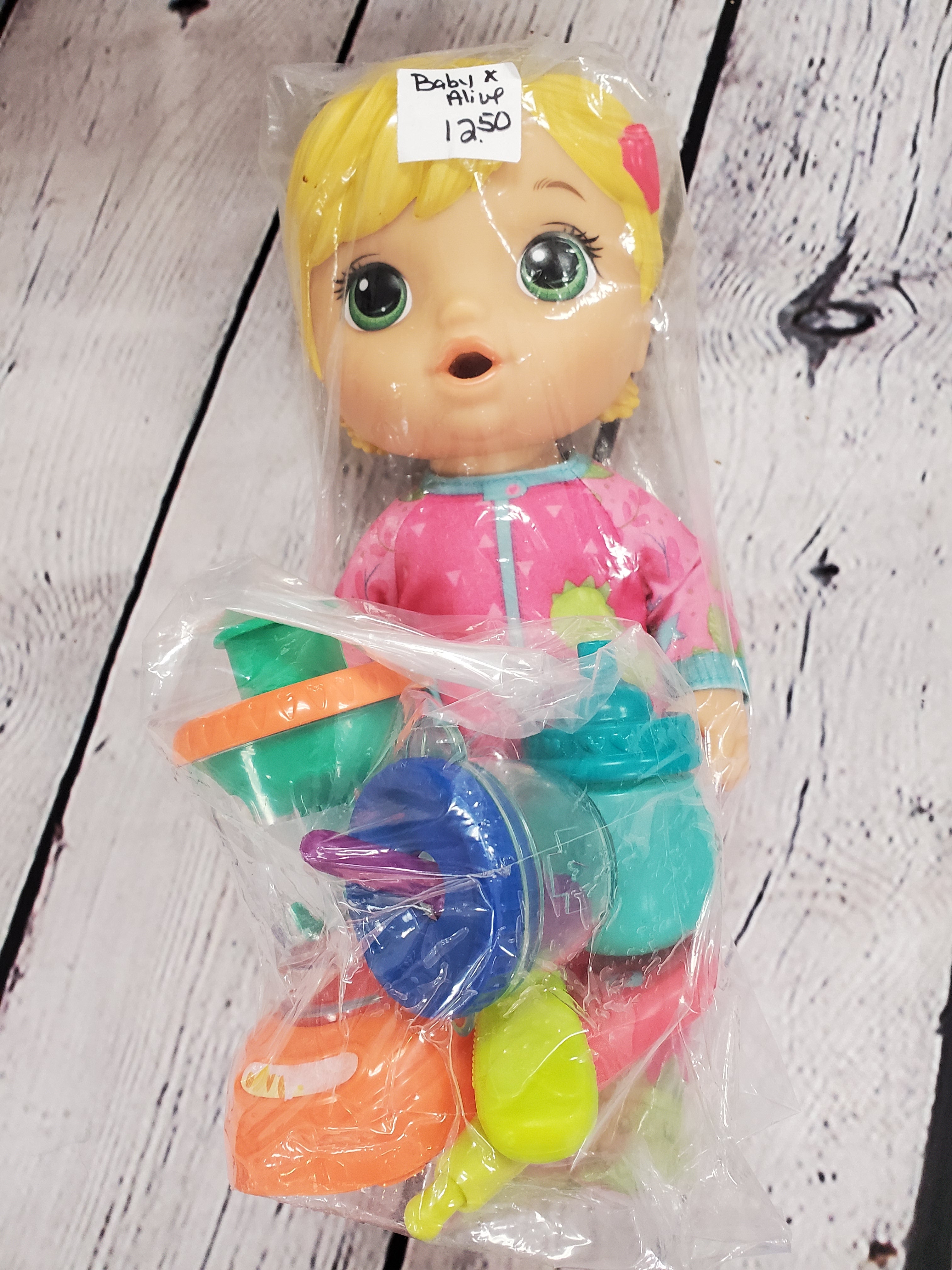 Baby Alive doll with accessories